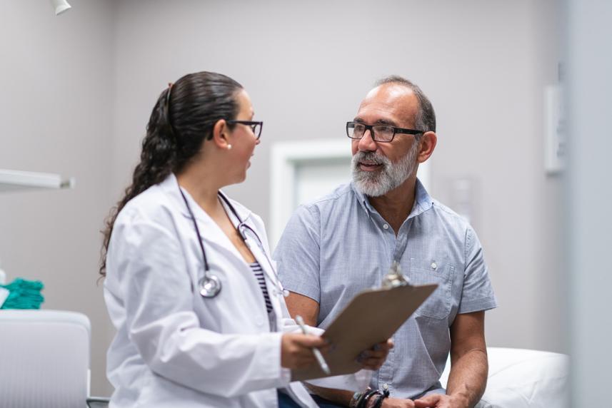Man talking to doctor